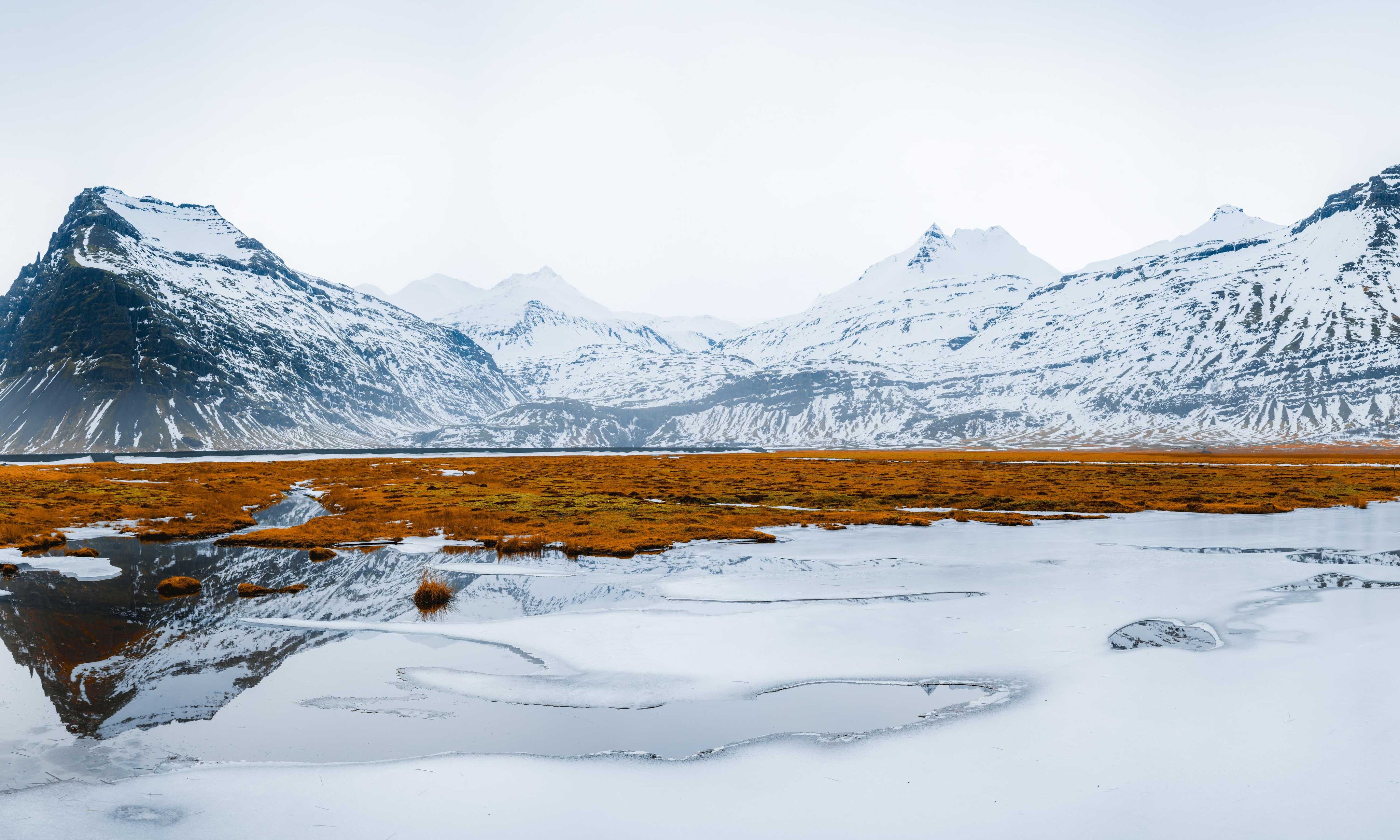 MediciMountainsreflectedinice-12080.jpg