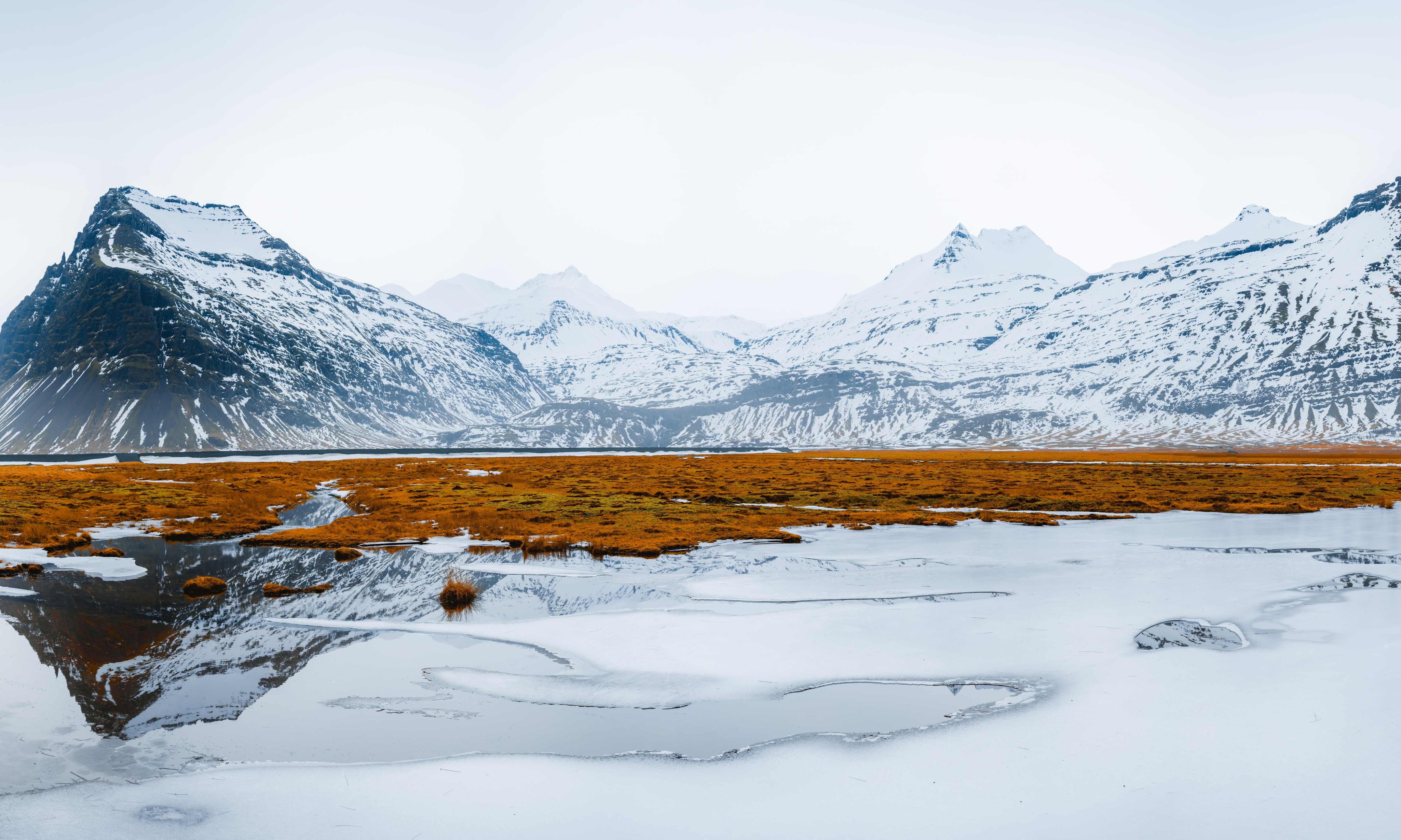 MediciMountainsreflectedinice-150100.jpg